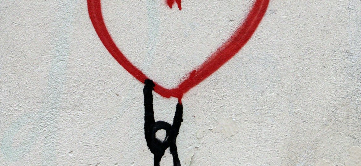 red heart and man hanging drawing